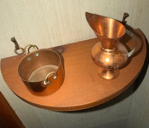 Copper Pitcher And Miniature Pot On Shelf
