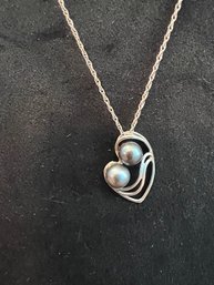 Abstract Mother And Child With Pearls Neacklace