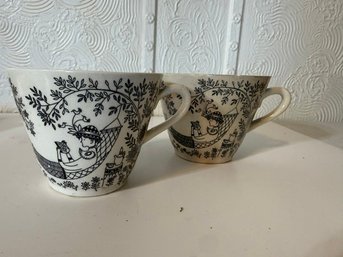 A Pair Of Black And White Cups Girl Reading In Hammock Made In Japan