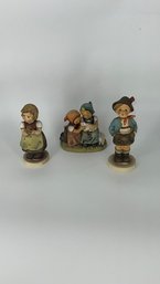 A Group Of Goebel W Germany Figurines Brother, For Mother And With Rabbit