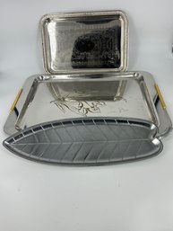 A Vintage Group Of Three Aluminum Ans Stainless Trays