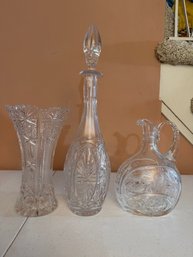 Group Of Three Crystal Decanters With Stoppers And Vase