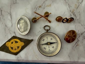 Collection Of Army Artifacts, Including German Compass And Rifle Photo Brooch
