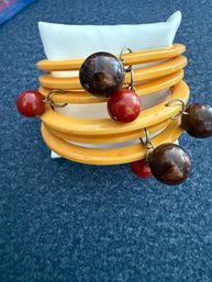 Set Of 6 Bangle Bracelets With A Bauble. Butterscotch