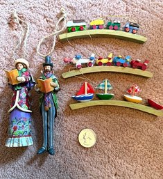 Wooden And Carved Holiday Ornaments Trains , Planes And Boats And Carolers