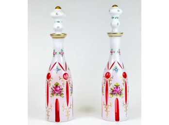 PAIR BOHEMIAN CUT TO CRANBERRY ENAMELED DECANTERS