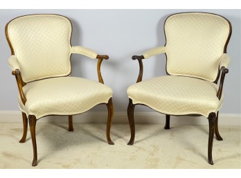 PAIR UPHOLSTERED LOUIS XV STYLE WALNUT FAUTEUILS