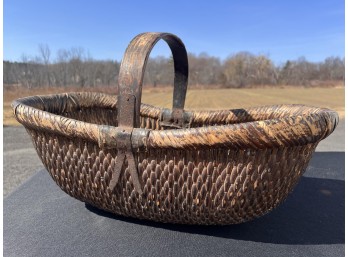 ANTIQUE WROUGHT IRON BOUND WOVEN BASKET