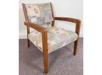 MID-CENTURY LOW BACKED ARMCHAIR