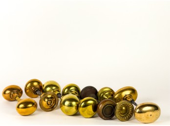 GROUP (7) MOSTLY BRASS DOOR KNOB & SPINDLE SETS
