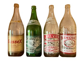 (4) VINTAGE GLASS BEVERAGE BOTTLES