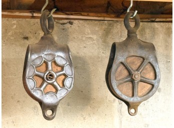 (2) CAST IRON BLOCKS w WOODEN WHEELS