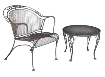 WROUGHT IRON ARMCHAIR with FLORAL MOTIF & STANDS
