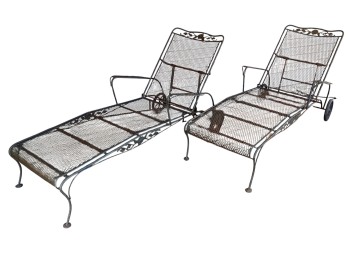 WROUGHT IRON RECLINING LOUNGERS with FLORAL MOTIF