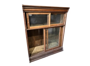 OAK BOOKCASE with ROLLING GLAZED DOORS