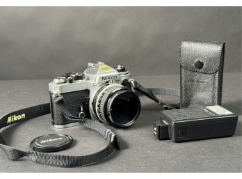 NIKON FE SLR 35 MM CAMERA w LENS