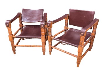 PAIR OF MID CENTURY LEATHER SAFARI CHAIRS