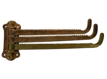 ANTIQUE HEAVY BRASS SWING ARM SAWTOOTH TOWEL RACK
