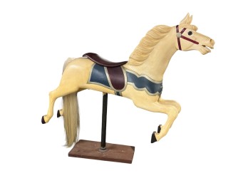 (Late 20th c) CARVED and PAINTED CAROUSEL HORSE