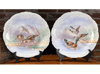 PAIR OF HAND PAINTED PORCELAIN BIRD CHARGERS