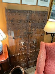 PAIR OF HEAVY WOOD AND IRON STRAPPED DOORS