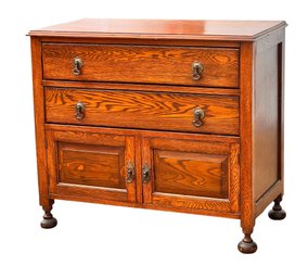 (Late 19th C) PANELED OAK COMMODE On TURNIP FEET