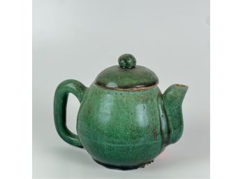 SIGNED CHINESE CERAMIC TEAPOT IN GREEN GLAZE