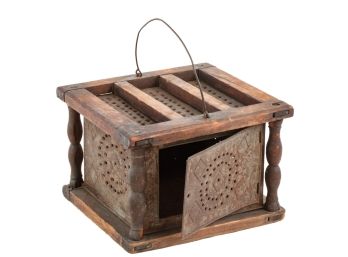 EARLY PUNCHED TIN AND WOOD FOOT WARMER