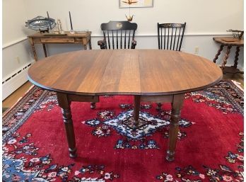 VINTAGE OVAL DROP LEAF DINING TABLE