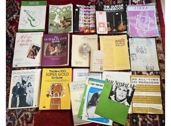 GROUPING OF GUITAR AND MUSIC BOOKS