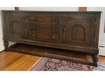 BEVAN FUNNELL CARVED OAK SIDEBOARD