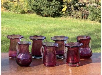 (7) SMALL CRANBERRY GLASS PITCHERS