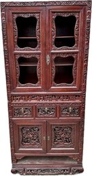 17. Chinese Heavily Carved Wood Cabinet