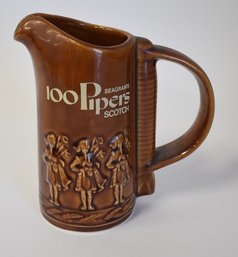 32. Seagram's 100 Pipers Scotch Pitcher