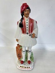 16. Metaxa Greek Liqueur Bottle