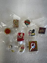 55. Collectors Lot Coca Cola Pin Backs (10)