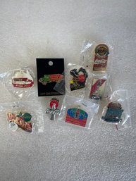 56. Collectors Lot Coca Cola Pin Backs (9)