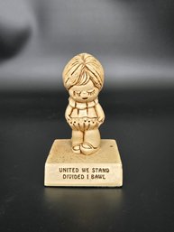 1970s 'United We Stand Divided I Bawl' Paula Company Figurine