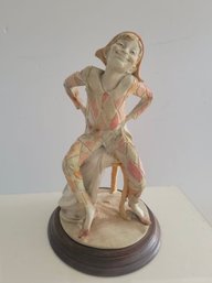 Vintage Giuseppe Armani Capdimonte Figurine Depicting A Seated Harlequin Jester