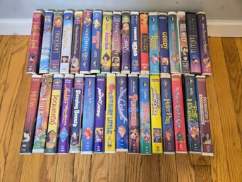 Impressive Collection Features 34  Vintage VHS Tapes, Consisting Primarily Of Disney Animated Classics