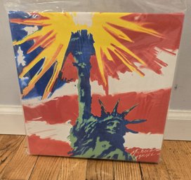 A Michael Israel Painting Featuring The Statue Of Liberty Against An American Flag Backdrop.