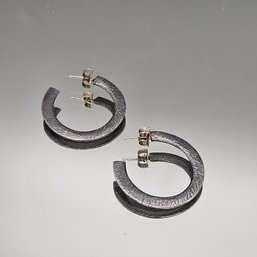 Silver Tone Textured Hoop Earrings.