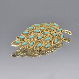Gold-Tone Leaf Brooch With Turquoise Cabochons