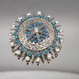 Vintage Silver-Tone Sunburst Medallion Brooch With Turquoise & Clear Rhinestones