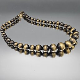 Brushed Gold Tone Graduated Bead Necklace 18'
