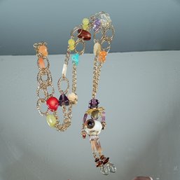 Human Shaped Glass Pendent Long Gold Tone Necklace