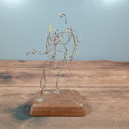 Wire Sculpture On Wood