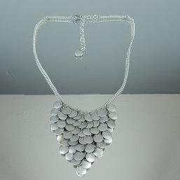 Silver-tone Bib Necklace With A Coin-shaped Dangling Design