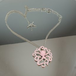 Silver-toned Necklace With A Pink Octopus Pendant And A Starfish Charm