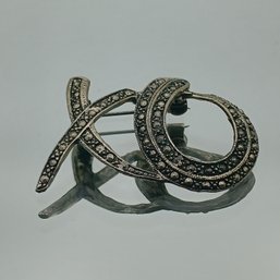 Silver Tone 'XO' Brooch